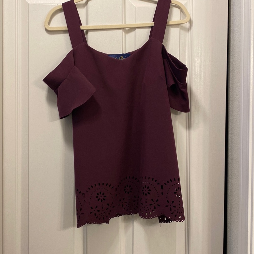 Size M, deep purple cold-shoulder, laser cut hem, purchased from Francesca’s